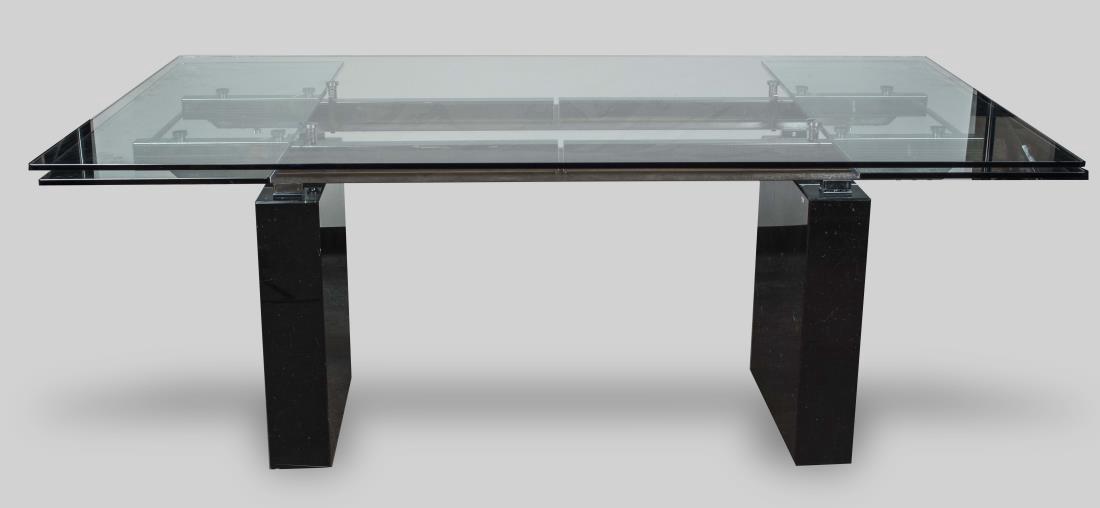 Glass Top Dining Table: Rectangular glass top on on trestle style base. Extended height 30 inches, width 112 inches, depth 42 inches. Notice to bidders: Condition reports and additional photographs are provided by request as