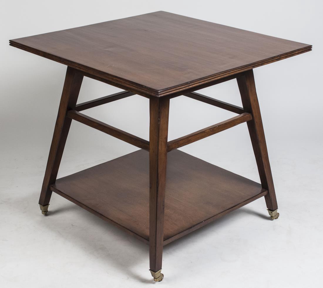 Charles Fradin Perry End Table: Square top with reeded edge, on tapered square legs joined by a lower open shelf and ending in brass casters. Height 28 inches, 30 inches square. Notice to bidders: Condition reports and additional ph