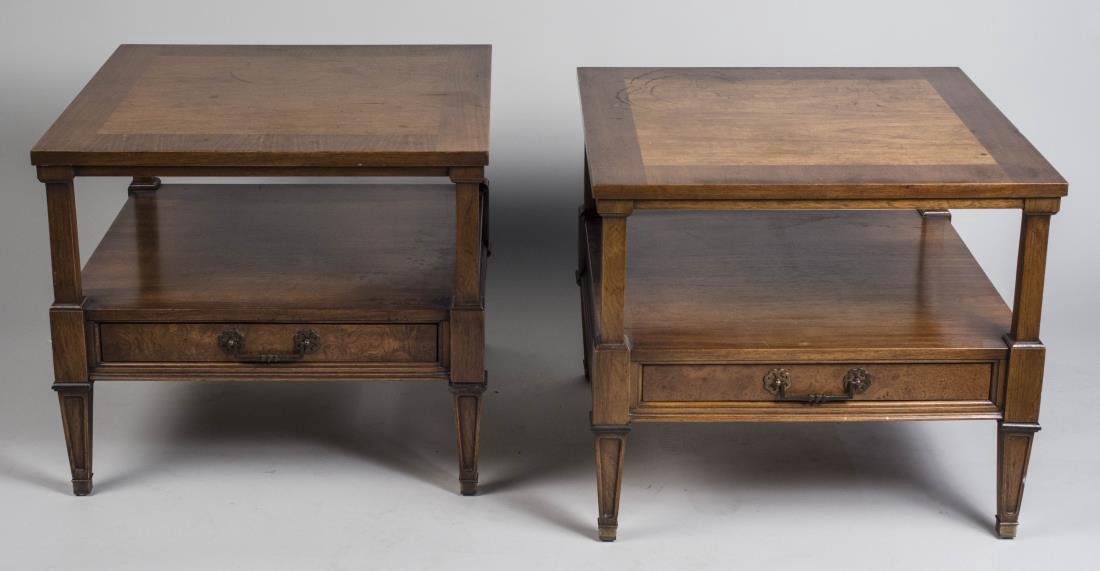 Pair of Two Tier Fruitwood End Tables: Neoclassical style, each with rectangular top with cross banded edge over an open shelf with medial drawer, on square tapered legs. Height 23 inches, width 25 3/4 inches, depth 26 inches. Notice to bi