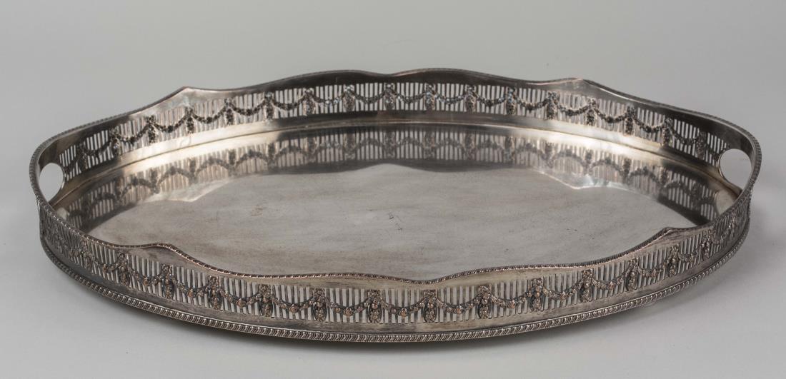 English 'William Adams' Serving Tray: Neoclassical style oval tray with gallery. Length 19 3/8 inches. Notice to bidders: Condition reports and additional photographs are provided by request as a courtesy to our clients, as such any condi