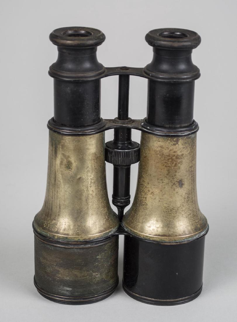 French Military Lemaire Binoculars: Circa 1890, Height 7 3/4 inches. Notice to bidders: Condition reports and additional photographs are provided by request as a courtesy to our clients, as such any condition report is only an opinion a