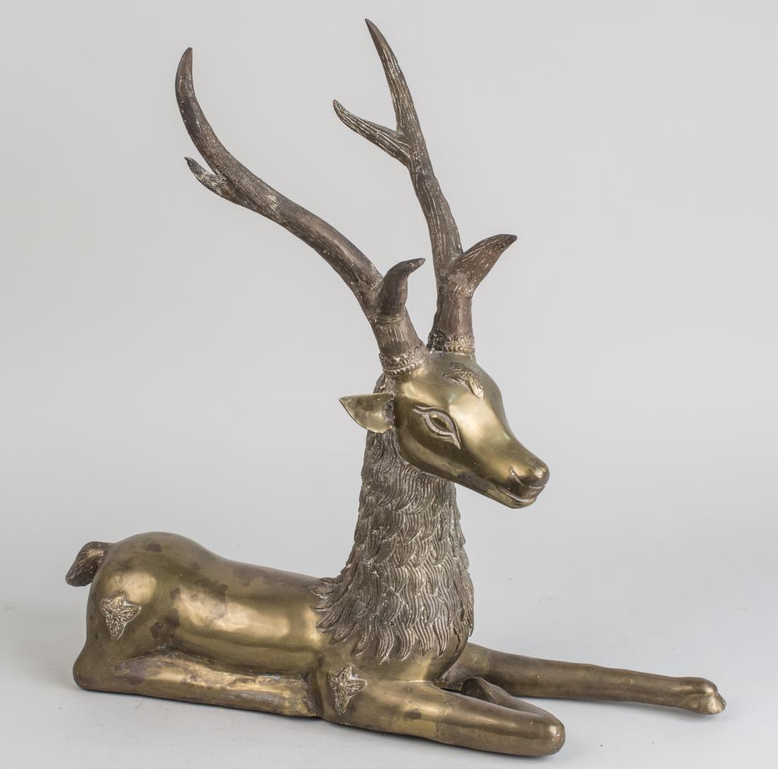 Brass Stag: Cast in reclining position. Height 22 inches. Notice to bidders: Condition reports and additional photographs are provided by request as a courtesy to our clients, as such any condition report is only