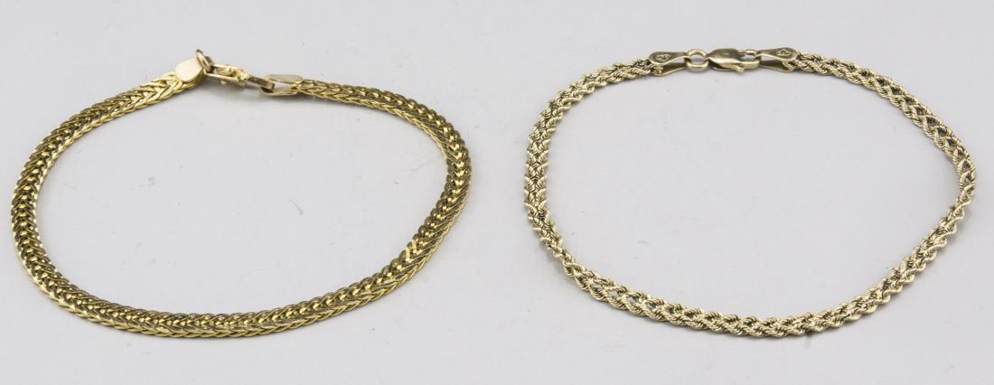 Two Gold Bracelets: 14k yellow gold chain bracelets. Both 7 inches, total 8.0 grams. Notice to bidders: Condition reports and additional photographs are provided by request as a courtesy to our clients, as such any condi