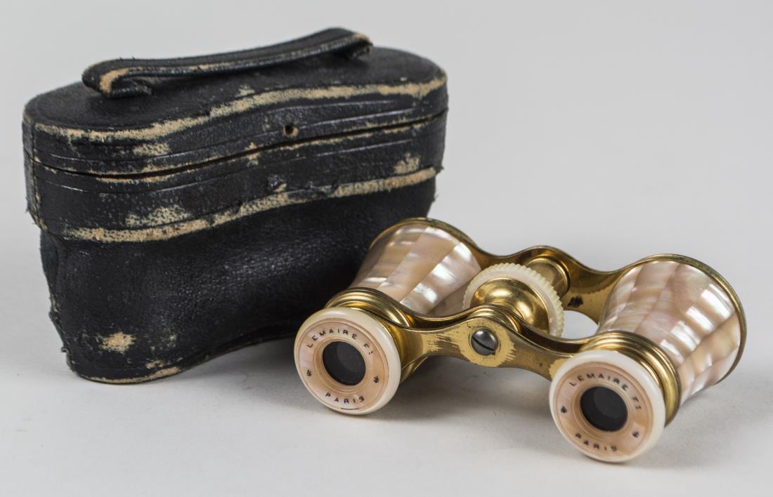 French Mother of Pearl Opera Glasses: Lemaire, Pairs, adjustable, in original leather case. Notice to bidders: Condition reports and additional photographs are provided by request as a courtesy to our clients, as such any condition report