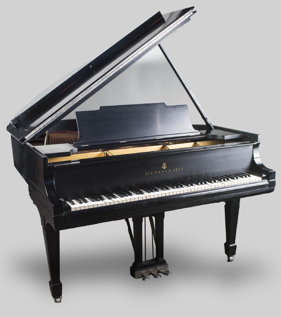 Steinway Grand Piano Model M: Serial number 185559, black ebonized case. Height 39 inches, width 57 1/2 inches, depth 66 inches. Notice to bidders: Condition reports and additional photographs are provided by request as a courtesy