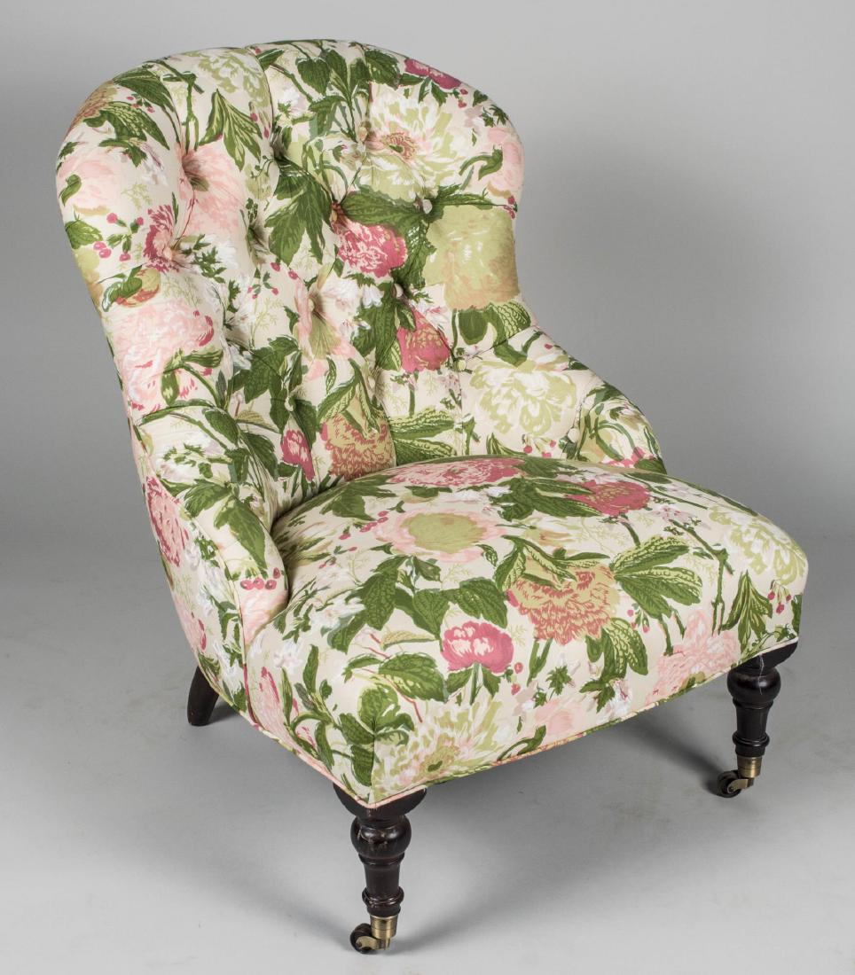William IV Style Club Chair: Pink floral print upholstery, turned wood legs. Height 35 inches, width 27 inches, depth 30 inches. Notice to bidders: Condition reports and additional photographs are provided by request as a courtes