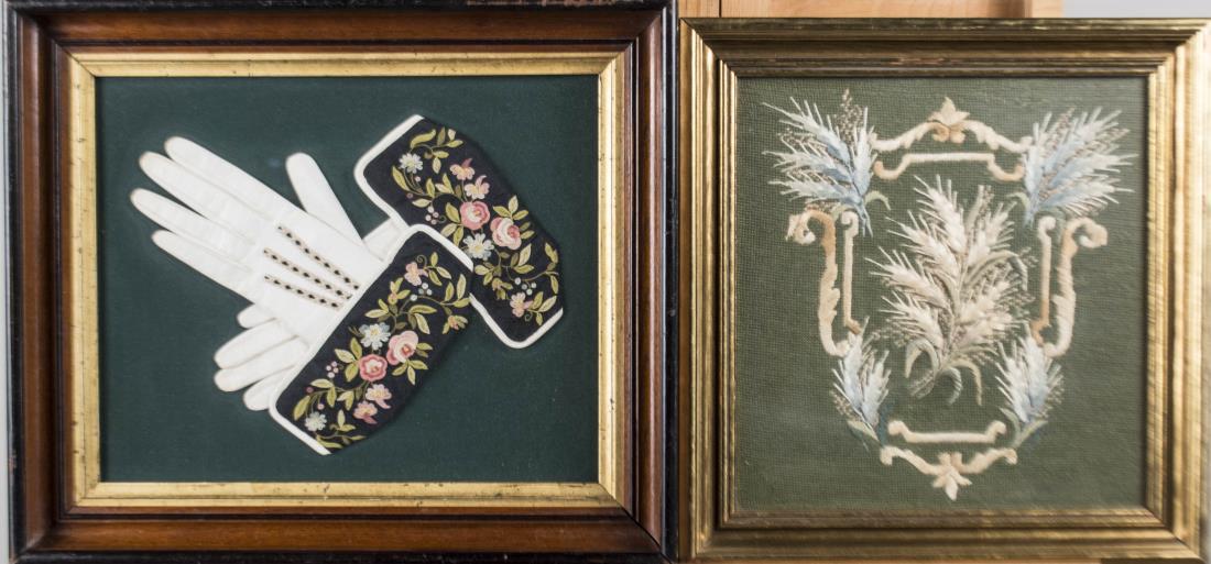 Two Needlework Pictures: One, a pair of vintage white leather gloves with embroidered cuff, in a hadowbox frame (12 3/4 x 10 1/4 inches); the other an embroidered armorial. (11 x 10 1/2 inches.) Notice to bidders: Condition r