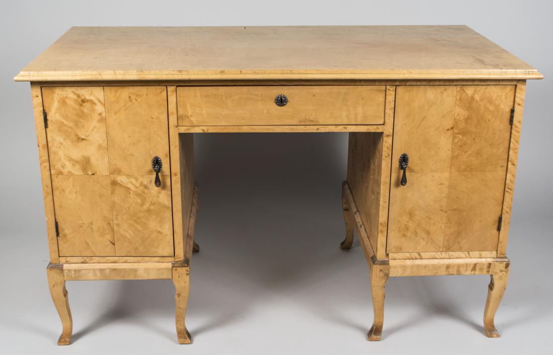 Biedermeier Style Desk: Rectangular top with molded edge over a central drawer, flanked by single door cabinets. Height 30 inches, width 49 inches, depth 25 inches. Notice to bidders: Condition reports and additional photogr