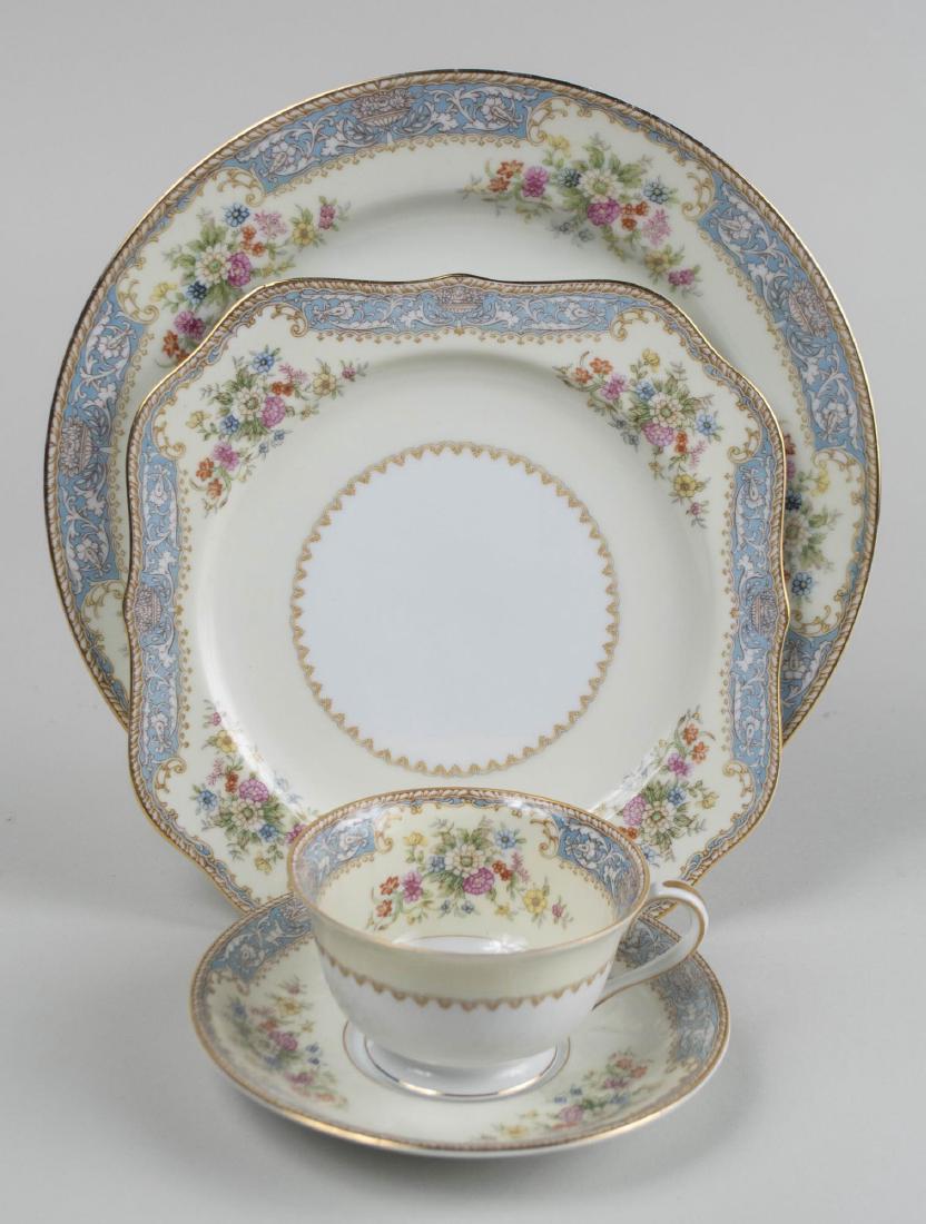 Noritake Porcelain Dinner Service: Cerulean pattern, comprising thirteen dinner plates, twelve salad plates, twelve square dessert plates, eleven soup plates, thirteen bread plates, twelve fruit bowls, twelve cream soup bowls with unde