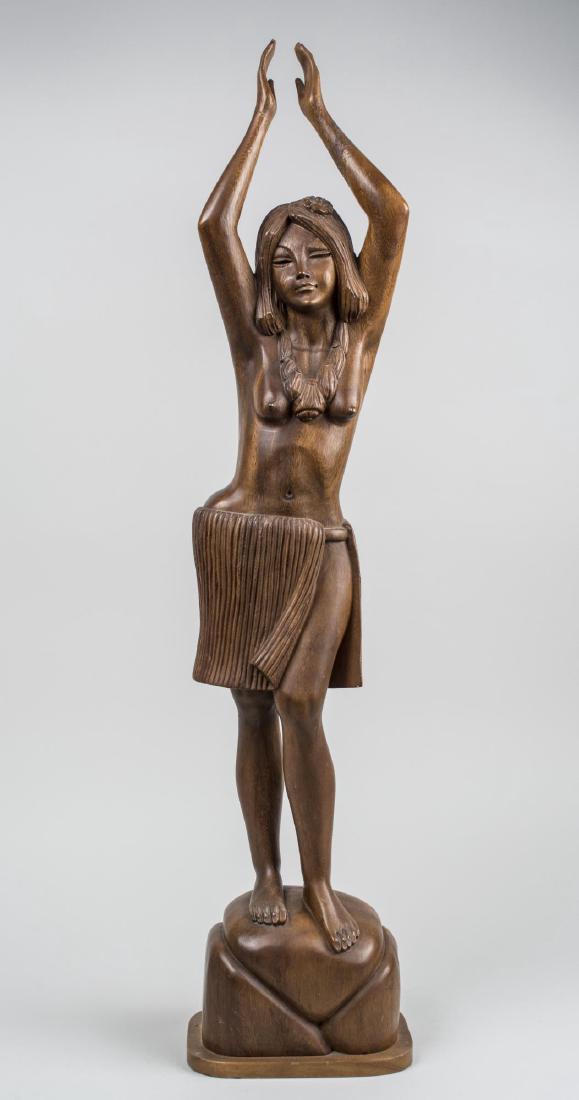 Polynesian Carved Wood Figure: Modeled as a female dancer (repaired). Height 37 inches. Notice to bidders: Condition reports and additional photographs are provided by request as a courtesy to our clients, as such any condition rep
