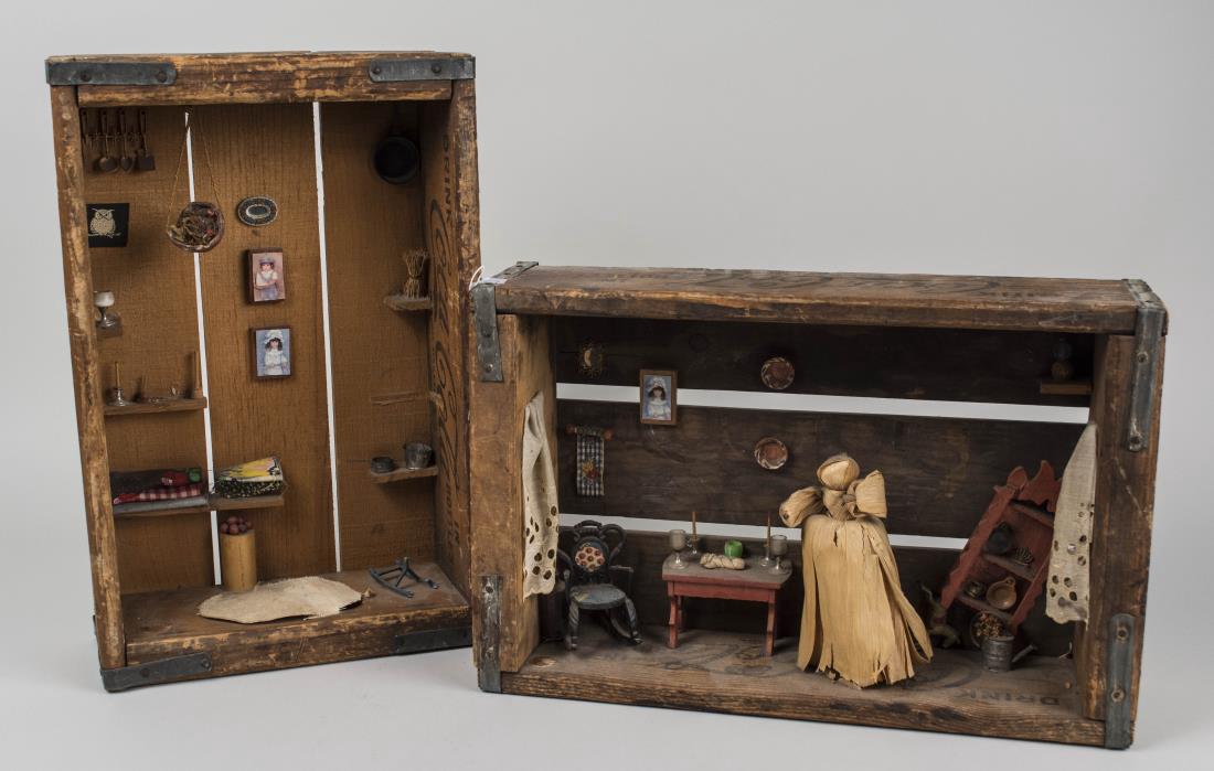 Pair of Folk Art Dioramas: Two small rooms. Mixed media, 20th century. Height of the larger one 12 inches. Notice to bidders: Condition reports and additional photographs are provided by request as a courtesy to our clients, as