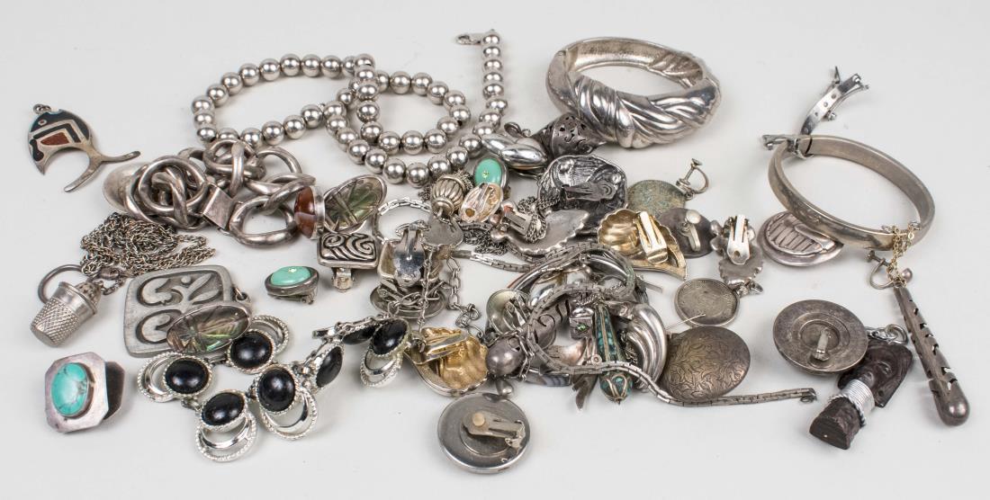 Group of Sterling and Silver Tone Jewelry: Including pins, bead necklace, bracelets and earrings, some signed. Notice to bidders: Condition reports and additional photographs are provided by request as a courtesy to our clients, as such any co