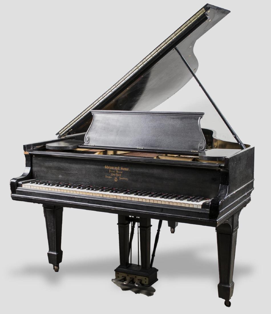 Steinway Grand Piano: Model O, serial number 102666, black lacquer case. Height 38 inches, width 56 inches, depth 70 inches. Notice to bidders: Condition reports and additional photographs are provided by request as a cour