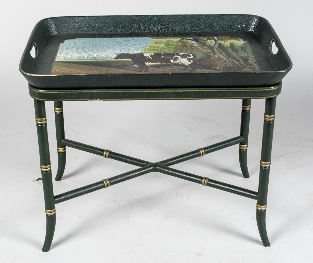 Victorian Style Tray Table: Decorated with a painting of a cow, on a separate faux bamboo base. Height 20 inches, width 24 inches, depth 16 inches. Notice to bidders: Condition reports and additional photographs are provided by 