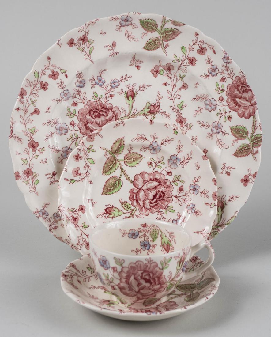 English Johnson Bros Tea Set: Rose Chintz pattern, comprising four dinner plates, four small plates, four bowls and four cups and saucers. Dinner plates, diameter 9 3/4 inches. Notice to bidders: Condition reports and additional p