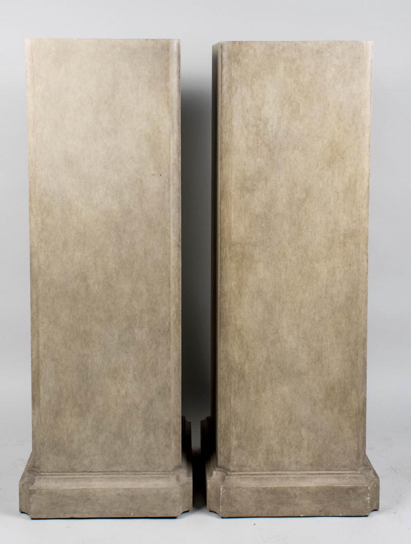 Pair of Dennis & Heen Pedestals: Louis XVI style wood painted faux stone pedestals. Height 53 inches, 17 inches square. Provenance: Holly Hunt, New York Notice to bidders: Condition reports and additional photographs are provided by 