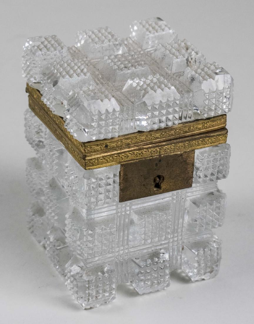 French Cut Glass Dresser Box: Square, with hatch cutting. Height 4 3/8 inches, 3 inches, square. Notice to bidders: Condition reports and additional photographs are provided by request as a courtesy to our clients, as such any con