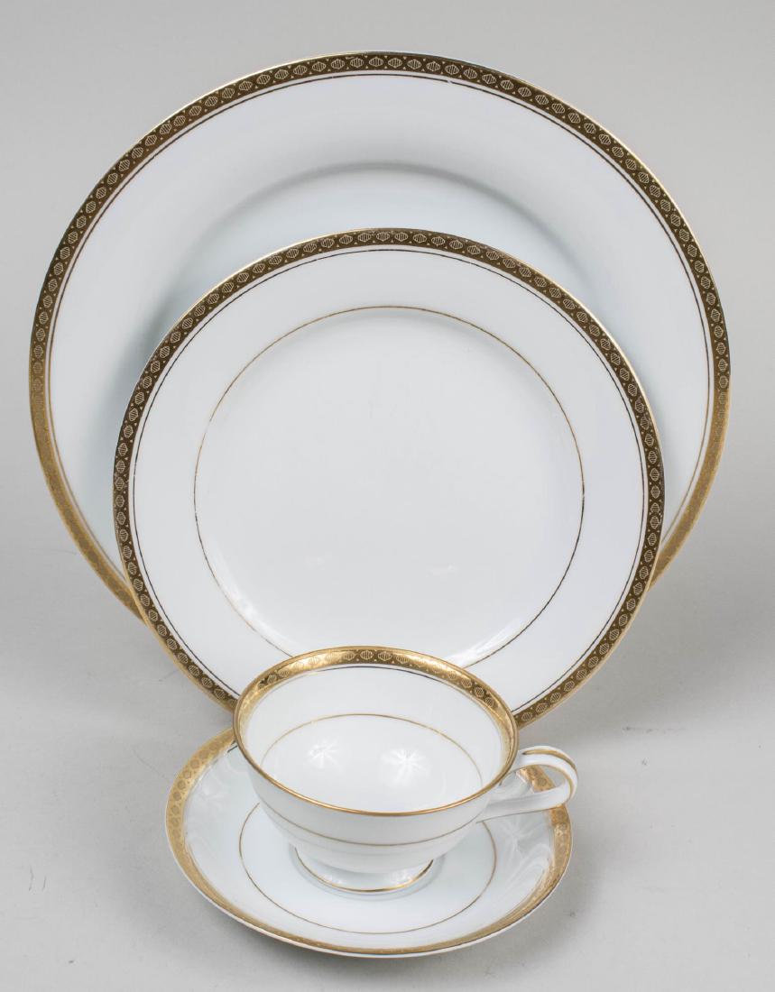Noritake Porcelain Dinner Service: Approximately eighty eight pieces, Richmond (6124) pattern, comprising twelve dinner plates, nine salad plates, eight bread plates, twelve bowls, eight fruit bowls, eleven cups, eleven saucers, a crea