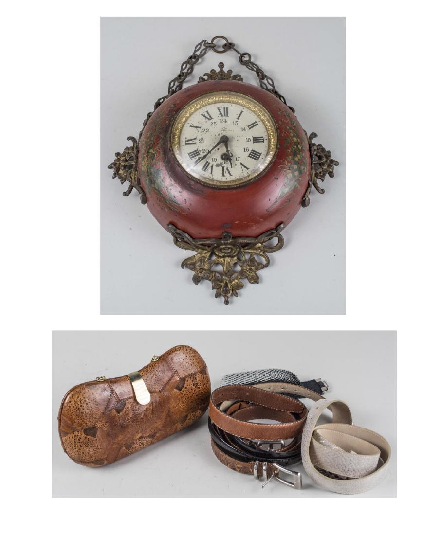 Group of Decorations: Including a tole wall clock In the form of a pocket watch, dial with Roman numerals, height 14 inches; together with a vintage lady's purse and vintage belts. Notice to bidders: Condition reports and
