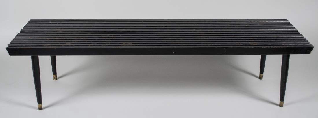 George Nelson Bench: Rectangular slatted top on tapered turned legs. Height 15 inches, width 60 inches, depth 18 inches. Notice to bidders: Condition reports and additional photographs are provided by request as a courtes