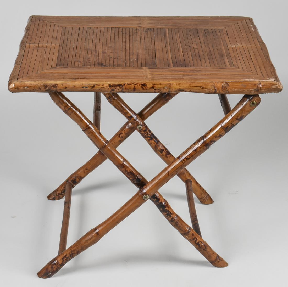 Bamboo Folding Tray Table: Rectangular top on a folding bamboo base. Open, height 23 inches, width 24 inches, depth 18 inches. Notice to bidders: Condition reports and additional photographs are provided by request as a courtes