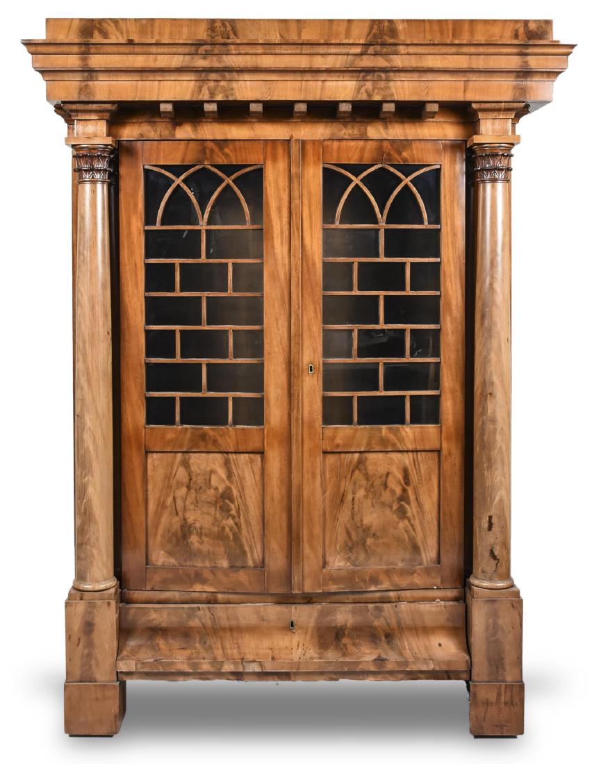 Biedermeier Cabinet: Rectangular top with overhanging edge, above two partially glazed panel doors opening to shelves, flanked by pilasters, above a single drawer, block feet. Height 6 feet 9 inches, width 59 inches, dept