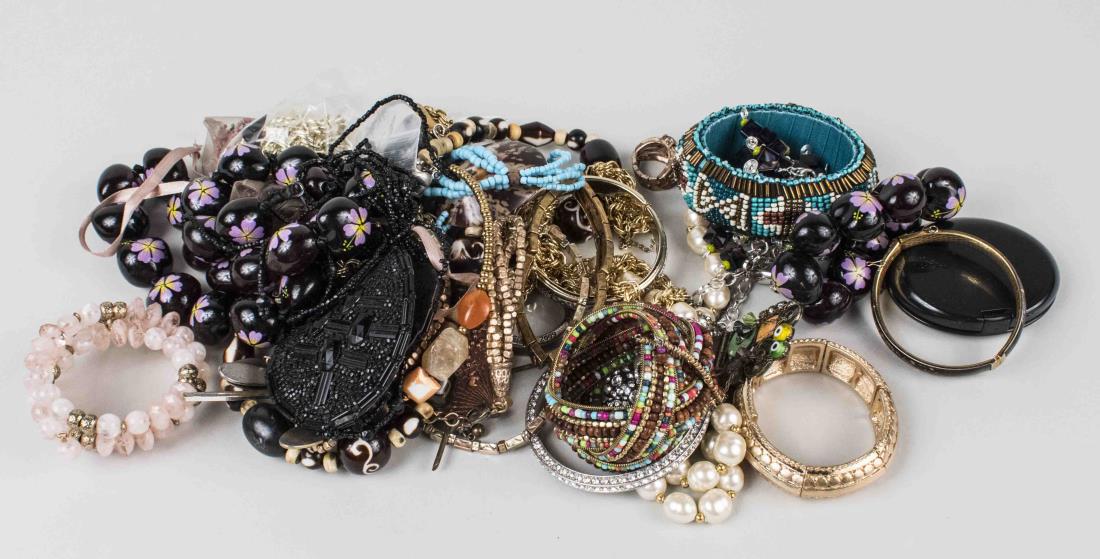 Group of Costume Jewelry: Mostly bead necklaces, some bracelets, bangles and pins. Notice to bidders: Condition reports and additional photographs are provided by request as a courtesy to our clients, as such any condition rep