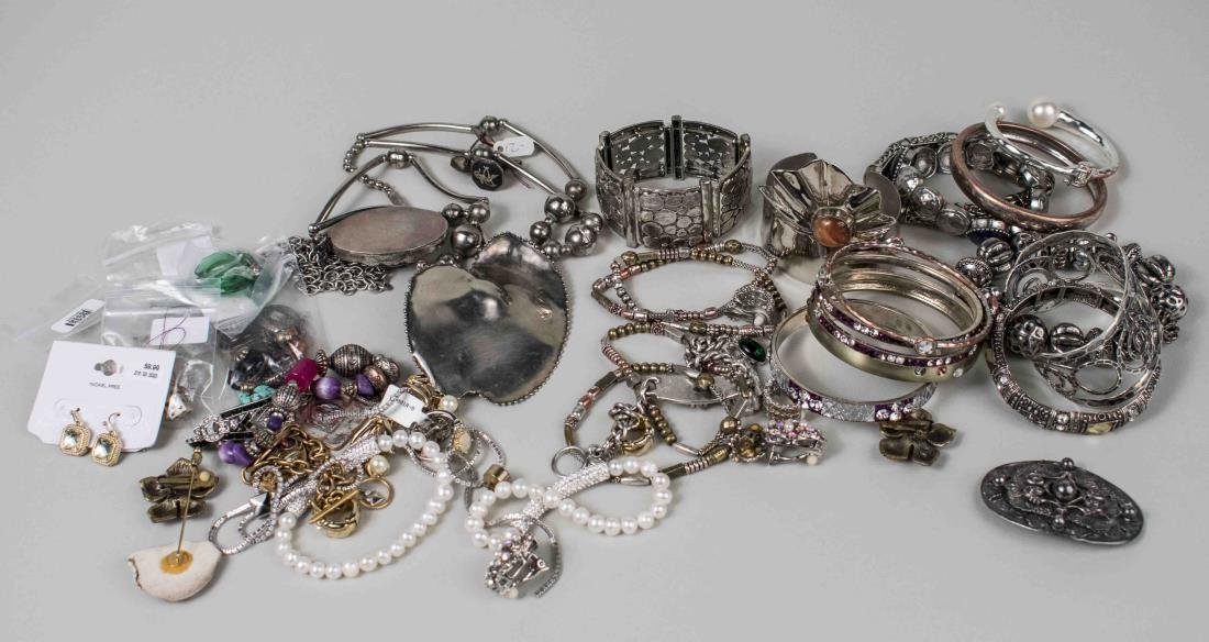 Group of Costume Jewelry: Silver tone jewelry, mostly bead necklaces, some bracelets, bangles and pins. Notice to bidders: Condition reports and additional photographs are provided by request as a courtesy to our clients, as s