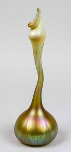 Tiffany Favrile Glass Gooseneck Sprinkler Vase: Gold favrile glass vase with elongated neck, etched M4356, original paper label. Height 14 inches. Note: A similar sprinkler is pictured in: Tiffany Favrile Art Glass, by Moise S. Steeg, Jr., Atglen,