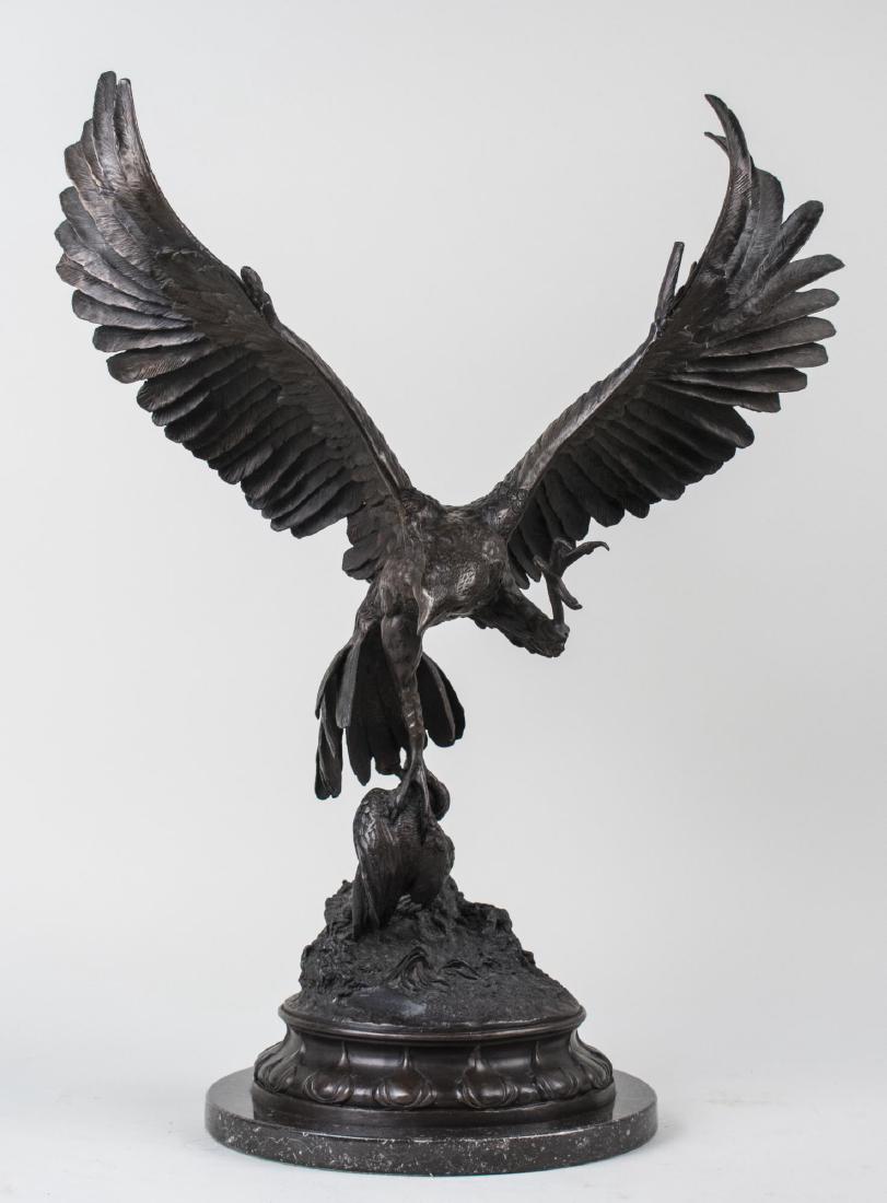 After Jules Moigniez Bronze Sculpture: Eagle. Bronze, 20th century. Signed 'J. Moigniez'. Height with base 24 inches. Notice to bidders: Condition reports and additional photographs are provided by request as a courtesy to our clients, as 