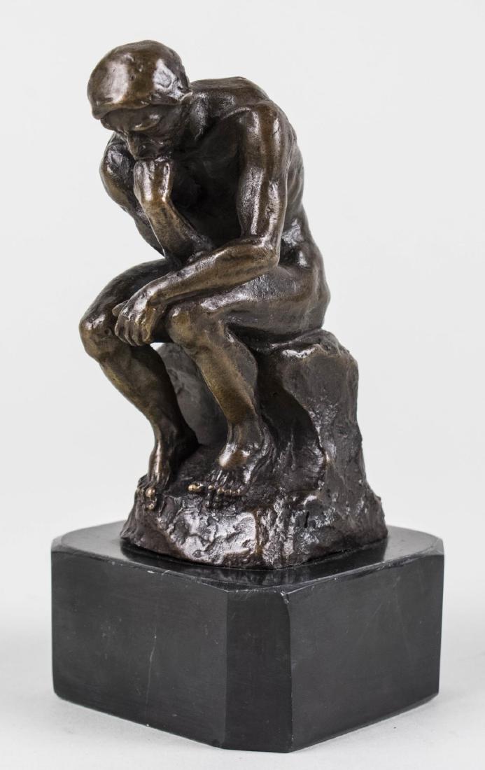 After Auguste Rodin, Small Thinker Bronze: Thinker. Bronze, 20th century. Signed illegibly. Height with base 7 inches. Notice to bidders: Condition reports and additional photographs are provided by request as a courtesy to our clients, as suc