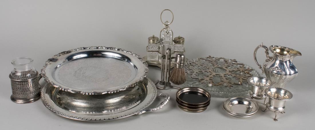 Group of Silver and Silver Plated Articles: Including a pair of sterling silver cigarette urns and ashtrays, silver plated trays and trivet, etc. Urns, height 2 1/2 inches, total 2 ounces weighable. Notice to bidders: Condition reports and addi