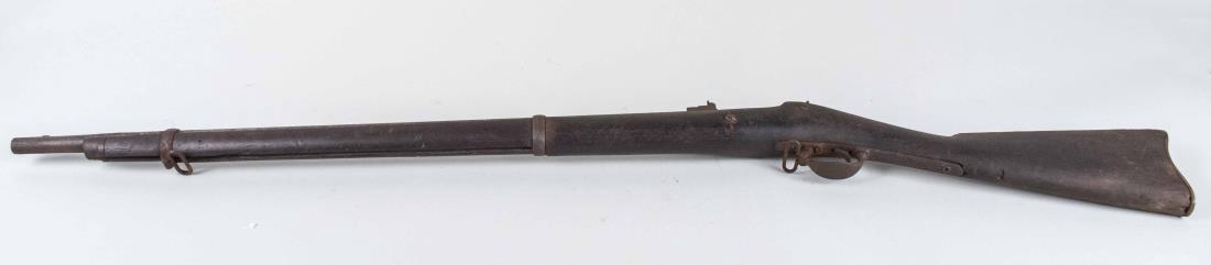 Civil War US Springfield Model 1863 Rifle-Musket: With a steel barrel stamped 1863, wood stock, the lock plate replaced with 1884 model stamped with eagle logo, U.S. 1884, no ramrod. Barrel length 32 inches, overall length 48 inches. Notice to bidder