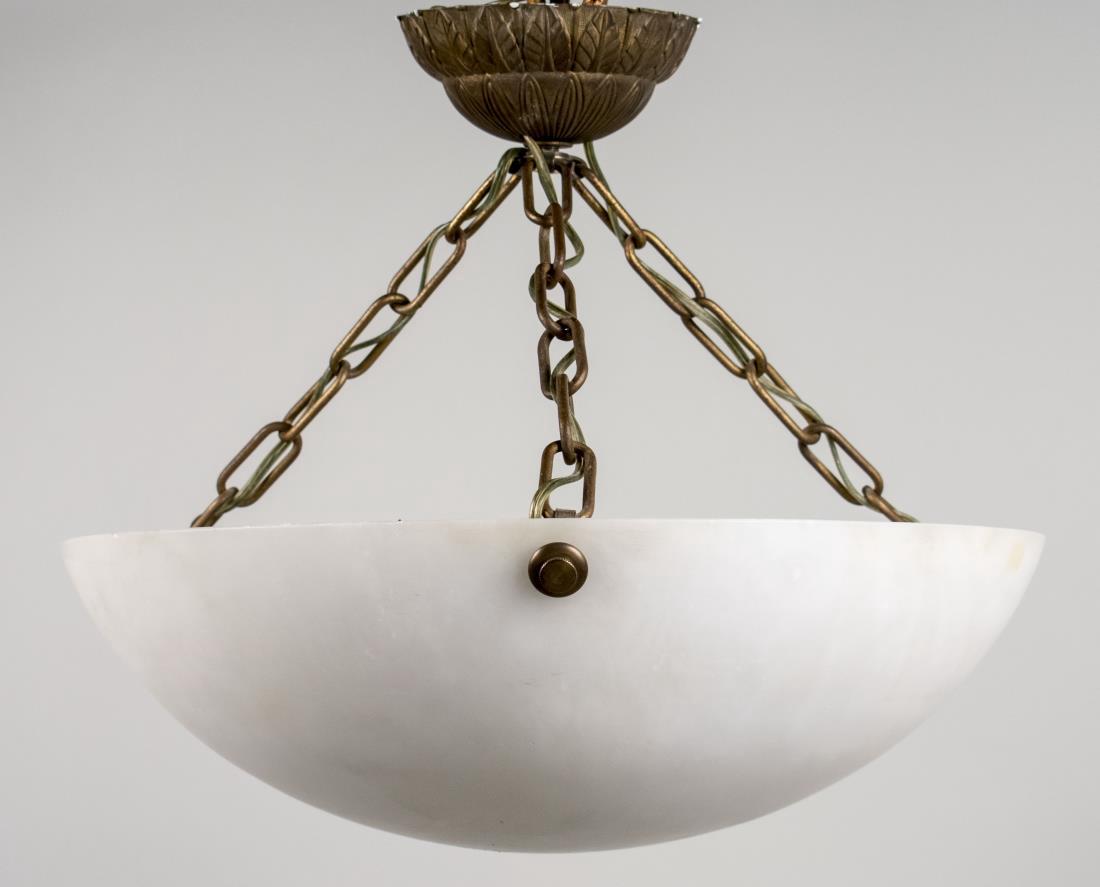 Art Deco Bronze and Alabaster Hanging Light: Inverted dome hanging by three chains. Height 15 inches, diameter 18 inches. Provenance: Estate of Sandy Gallin Notice to bidders: Condition reports and additional photographs are provided by request