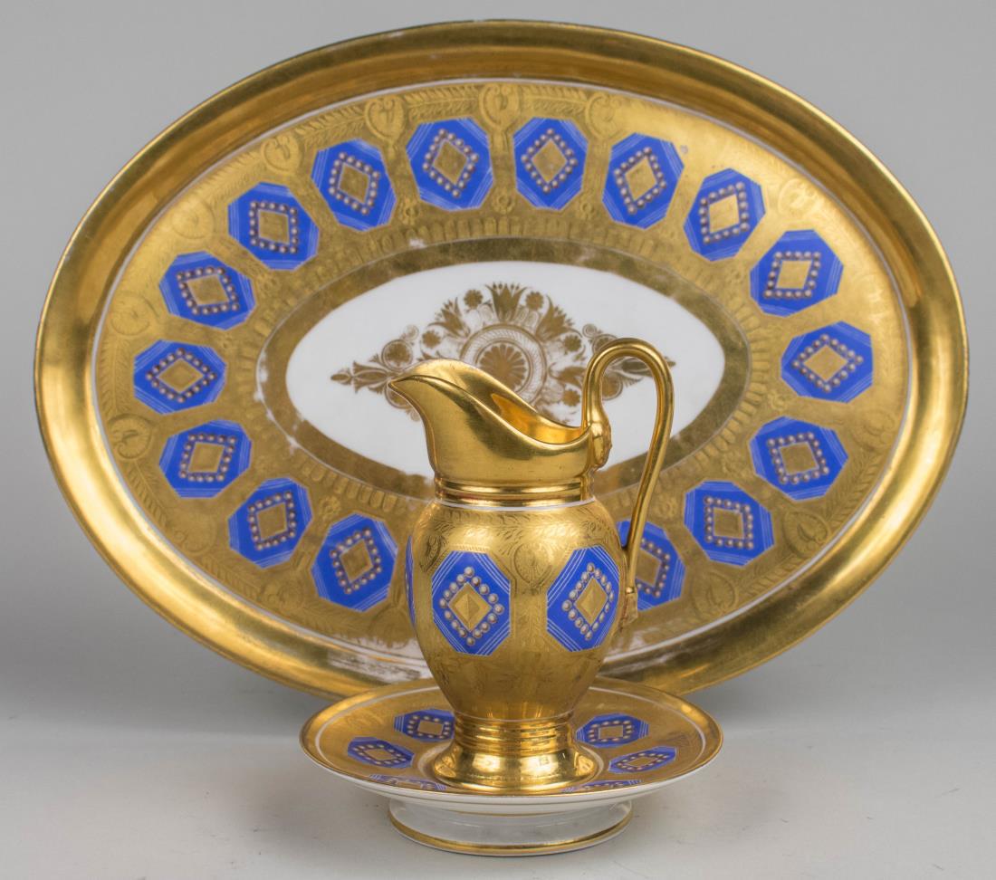 Russian Gardner Porcelain Table Articles *: Early 19th century, comprising an oval tray, a milk jug and a footed dish, marked in red and with impressed St. George & dragon, probably originally pieces from a tete a a tete. Tray, length 13 1/8 in