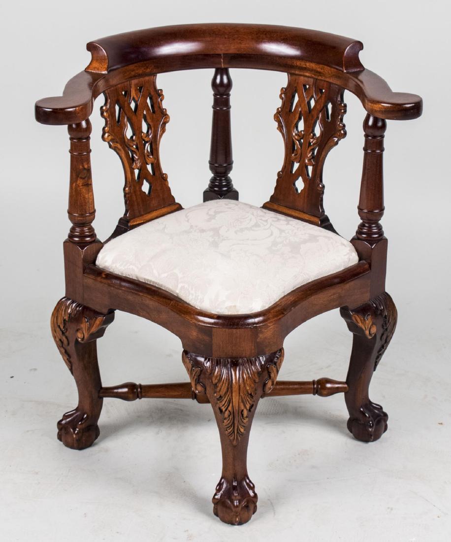 Georgian Style Mahogany Miniature Corner Chair: Tablet crest rail over two vase shaped ribbon splats, upholstered slip seat and acanthus leaf capped cabriole legs ending in claw and ball feet. Height 22 inches, width 19 inches, depth 17 inches. Not