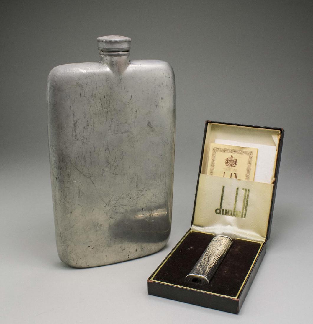 Dunhill Lighter & Flask *: Silver tone lighter with bark finish, in original box; together with an Abercrombie & Fitch vintage metal flask. Notice to bidders: Condition reports and additional photographs are provided by request