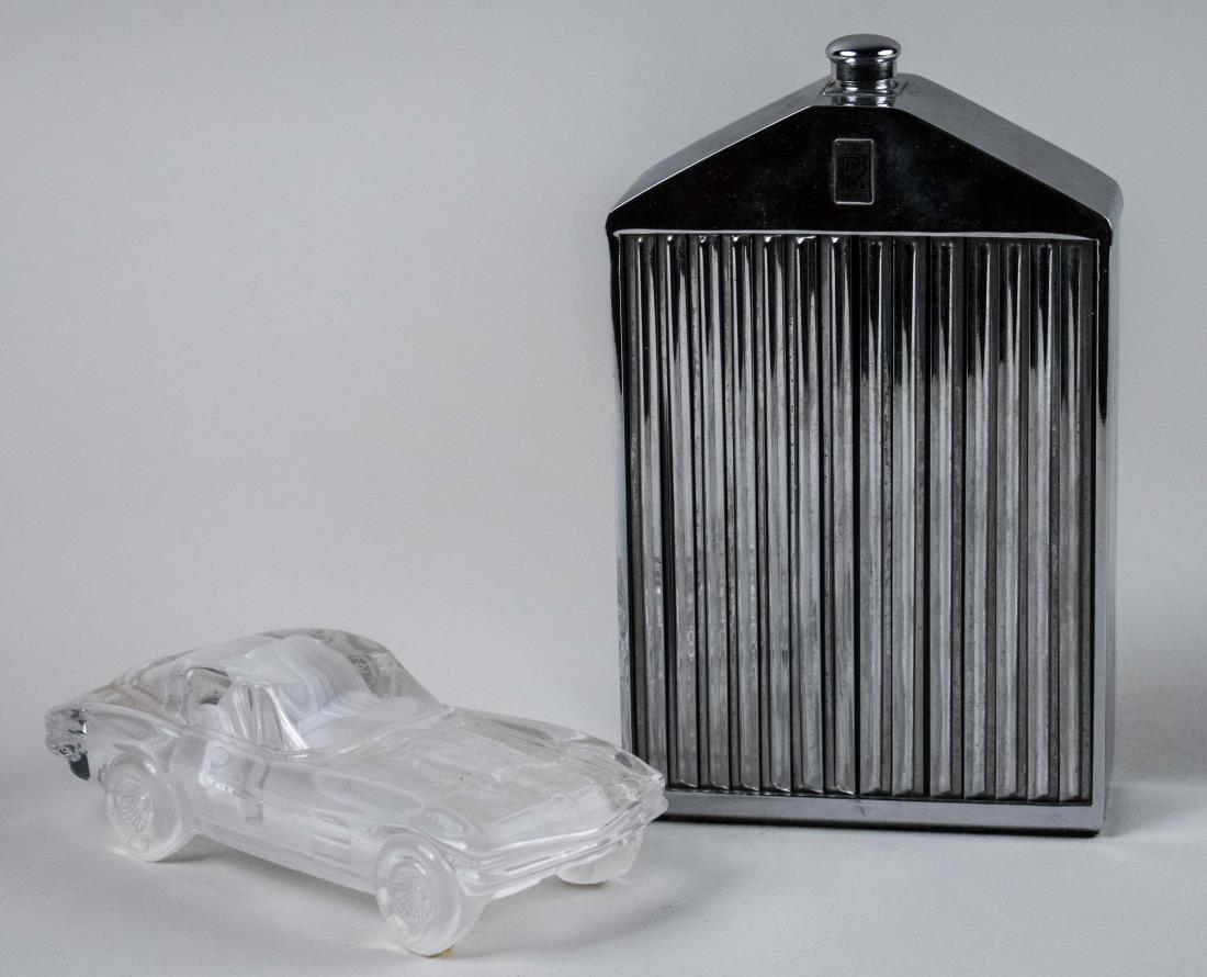 Flask and Glass Car Model: Flask, height 7 3/4 inches. Notice to bidders: Condition reports and additional photographs are provided by request as a courtesy to our clients, as such any condition report is only an opinion and sh