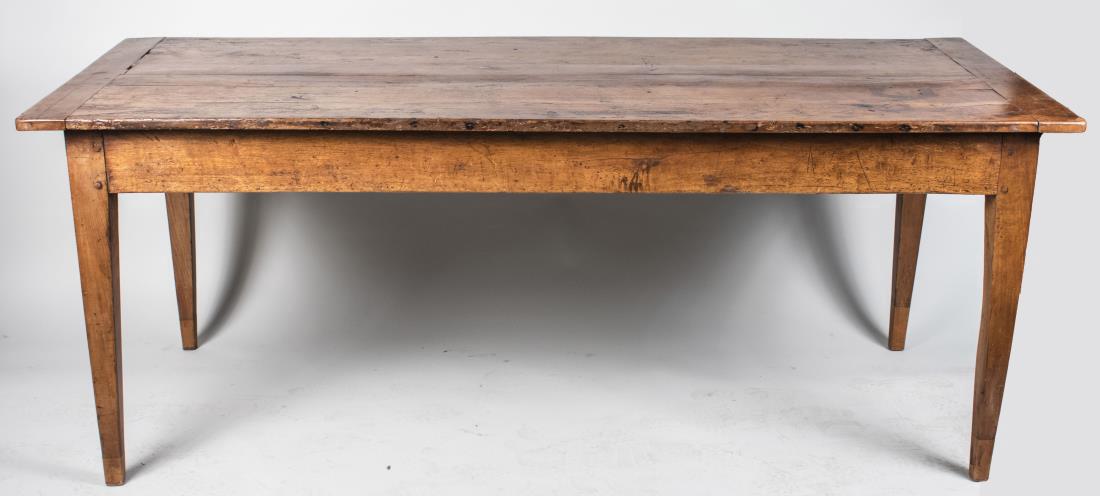 Harvest Table: Rectangular top on square tapered legs. Height 30 1/2 inches, width 6 feet 6 1/2 inches, depth 31 1/2 inches. Notice to bidders: Condition reports and additional photographs are provided by request as