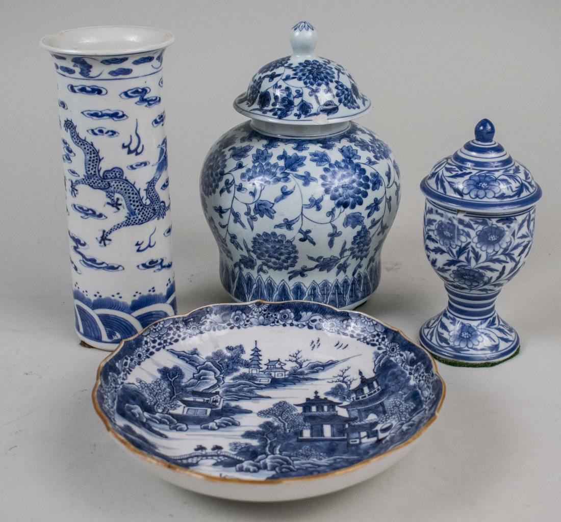 Four Chinese Blue and White Porcelain Articles: Including a vase, two covered jars and a dish. Vase, height 8 1/4 inches. Notice to bidders: Condition reports and additional photographs are provided by request as a courtesy to our clients, as such