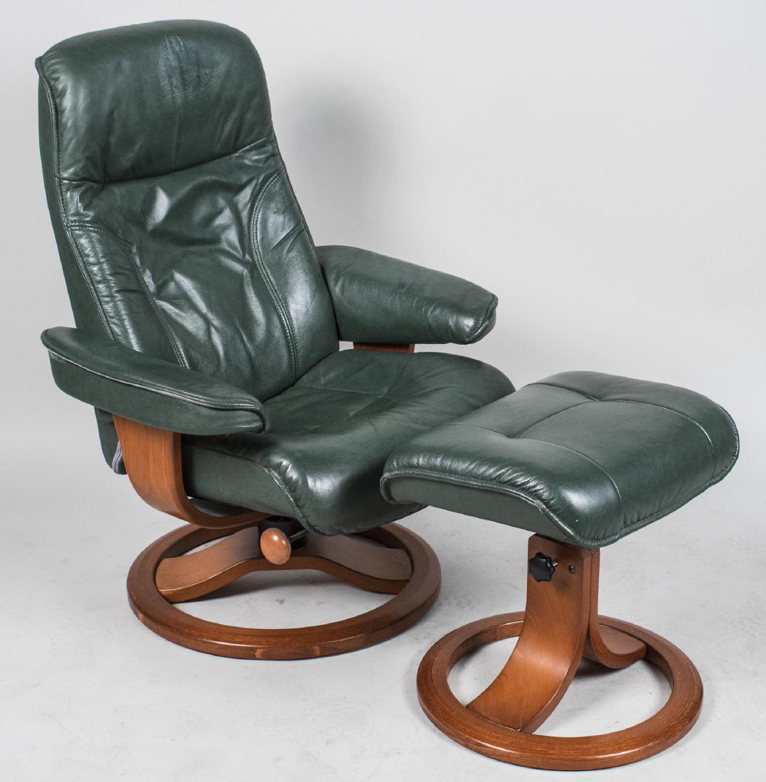 Fjords Alfa 520 Ergonomic Chair & Ottoman: Fjords Alfa 520 Ergonomic green leather recliner and matching ottoman. Height 38 inches, width 30 inches, depth 26 inches. Notice to bidders: Condition reports and additional photographs are provided