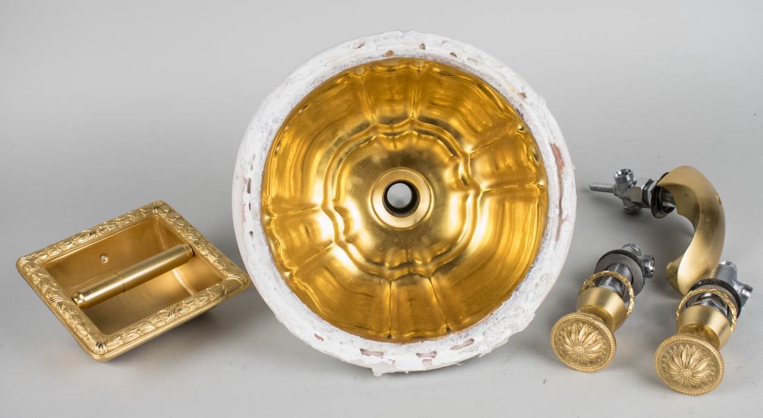 Sherle Wagner Sink: Gilt ceramic sink with hardware and fixtures. Sink, diameter outside 12 3/4 inches. Notice to bidders: Condition reports and additional photographs are provided by request as a courtesy to our clients