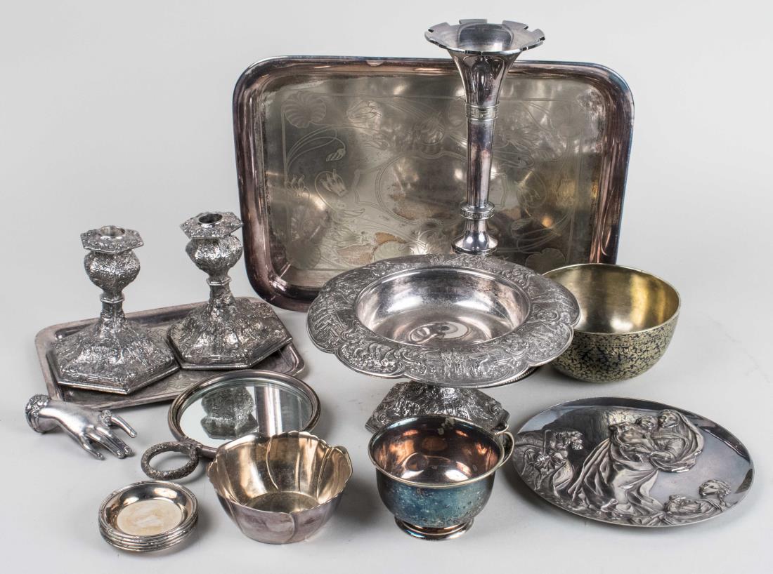 Group of Silver Plated Table Articles: Including a compote, pair of candlesticks, trumpet vase, two trays, small dishes, etc. Notice to bidders: Condition reports and additional photographs are provided by request as a courtesy to our clie