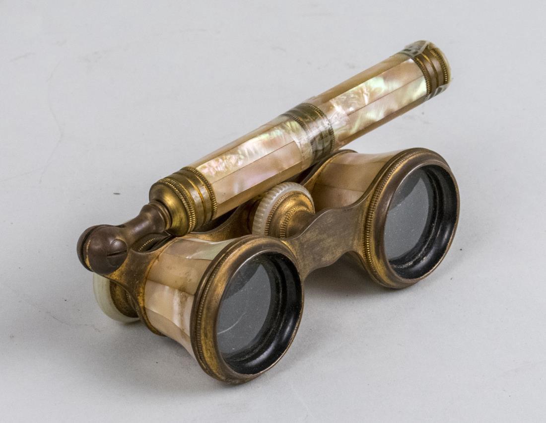 Mother of Pearl Opera Glasses: Mother of pearl case with handle. Notice to bidders: Condition reports and additional photographs are provided by request as a courtesy to our clients, as such any condition report is only an opinion