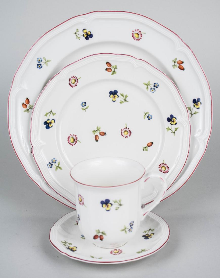 Villeroy & Boch Porcelain Dinner Set: Petit Fleur pattern, comprising eighteen dinner plates, eleven salad plates, nine bread plates, four mugs and two teacups, six saucers, ten soup bowls, seven cereal bowls, ten fruit bowl, six soup pla