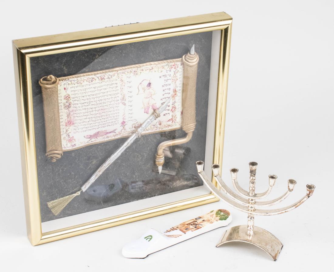 Three Judaica Decorations: Including a ceramic Mezuzah, a silvered metal menorah and a picture in a shadowbox frame. Menorah, height 5 1/2 inches. Notice to bidders: Condition reports and additional photographs are provided by 