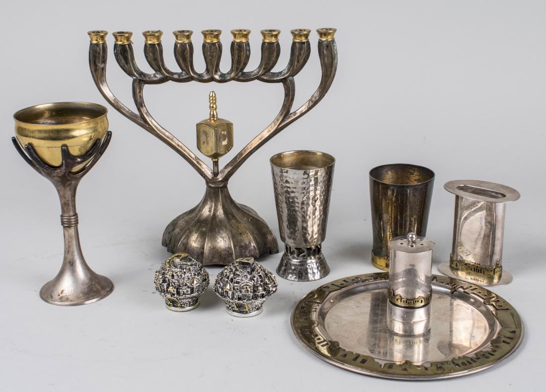 Group of Judaica Articles: Including a silver plated menorah music box, a Rosenthal Tree of Life kiddush cup, a set of four sterling silver seder articles with brass accents, etc. Menorah, height 8 1/2 inches. Notice to bidders