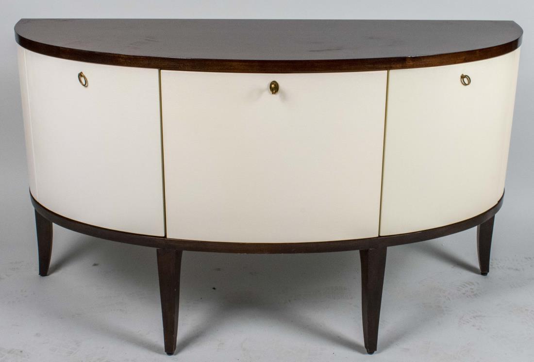 Contemporary Style Credenza: D shaped stained wood top over four white simulated leather doors opening to shelves. Height 34 inches, width 58 inches, depth 22 inches. Notice to bidders: Condition reports and additional photograph