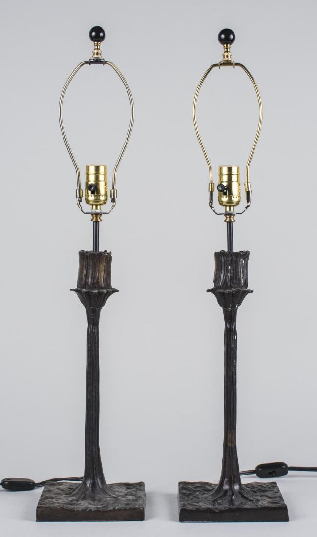 Pair of Giacometti Style Lamps: Single light naturalistic designed lamps. Base, height 16 inches, Notice to bidders: Condition reports and additional photographs are provided by request as a courtesy to our clients, as such any cond