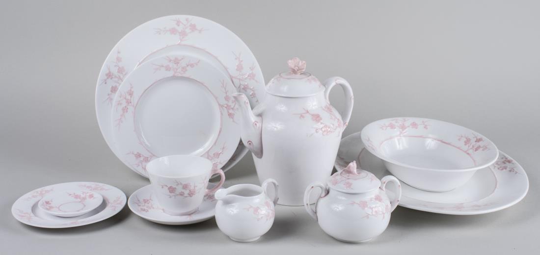 Spode Porcelain Dinner Service: Approximately one hundred fifty pieces, Blanche de Chine (pink) pattern, comprising twenty three dinner plates, twenty four salad plates, twenty four bread plates, twenty four cups, twenty six saucers